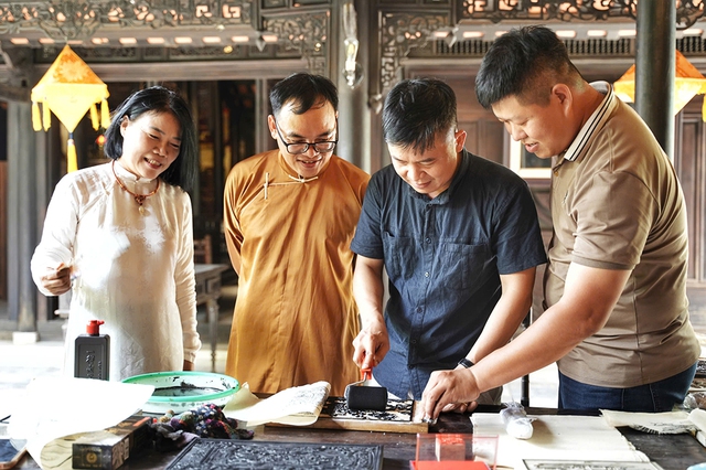 Tiếp nối mạch nguồn Di sản thế giới Mộc bản triều Nguyễn- Ảnh 3.